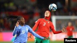 Morocco's Nouhaila Benzina in action with France's Naomie Feller at the FIFA Women’s World Cup Round of 16 match August 8, 2023