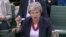 A still image from video footage shows Britain's Prime Minister Theresa May speaking at a Select Committee hearing, in London, Nov. 29, 2018. 