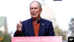 FILE - Former mayor of New York City Michael Bloomberg speaks to the media in Jackson, Miss., Nov. 29, 2018. Bloomberg’s philanthropy has announced a $50 million donation to help fight the nation’s opioid epidemic.