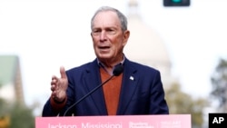 FILE - Former mayor of New York City Michael Bloomberg speaks to the media in Jackson, Miss., Nov. 29, 2018. Bloomberg’s philanthropy has announced a $50 million donation to help fight the nation’s opioid epidemic. 
