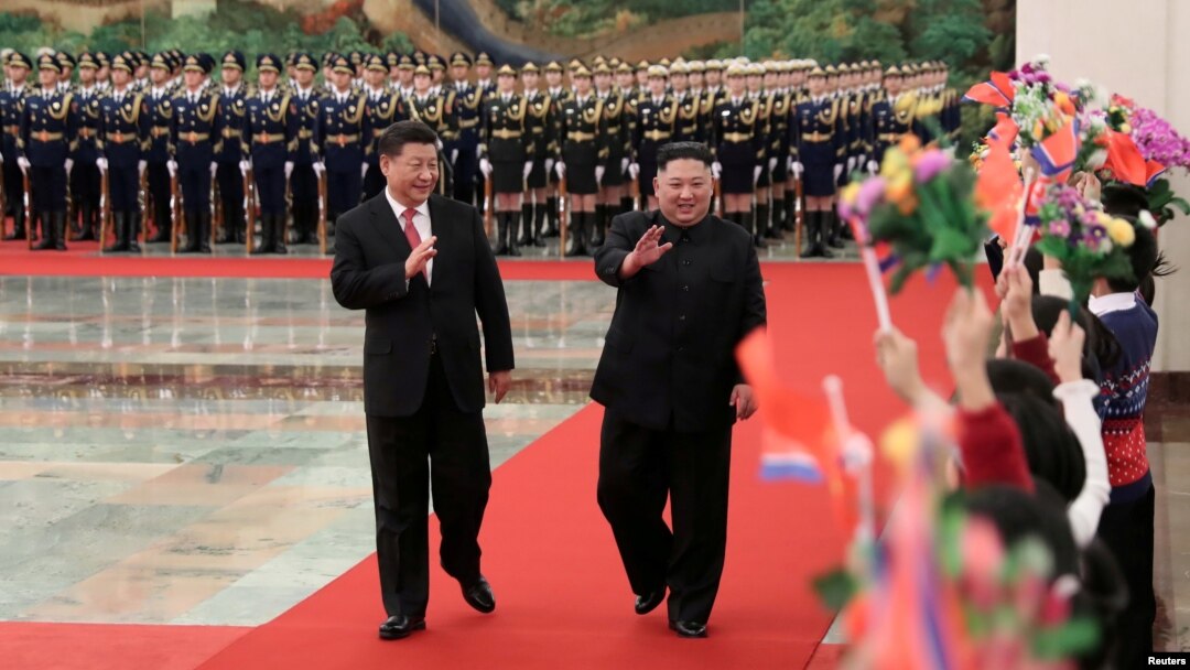 Chinese President Xi Jinping holds a welcoming ceremony for North Korean leader Kim Jong Un before their talks at the Great Hall of the People in Beijing, Jan. 8, 2019, in this picture released by Xinhua, Jan. 10, 2019.