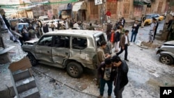 Hiện trường một vụ nổ bom ở thủ đô Sanaa của Yemen, ngày 23/12/2014.