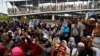 FILE - People protest outside Indonesia's Election Supervisory Board (Bawaslu) headquarters in Jakarta, Indonesia, May 10, 2019. 