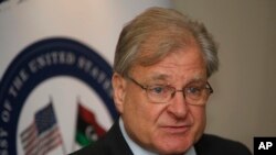 FILE: Richard Norland, the U.S. Special Envoy to Libya who also serves as the U.S. Ambassador to Libya, gives a press conference, in Tripoli, Libya, Thursday, Mar. 17, 2022.
