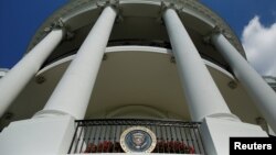 FILE - The Truman Balcony and Presidential seal are seen in Washington, D.C., Oct. 3, 2016. 