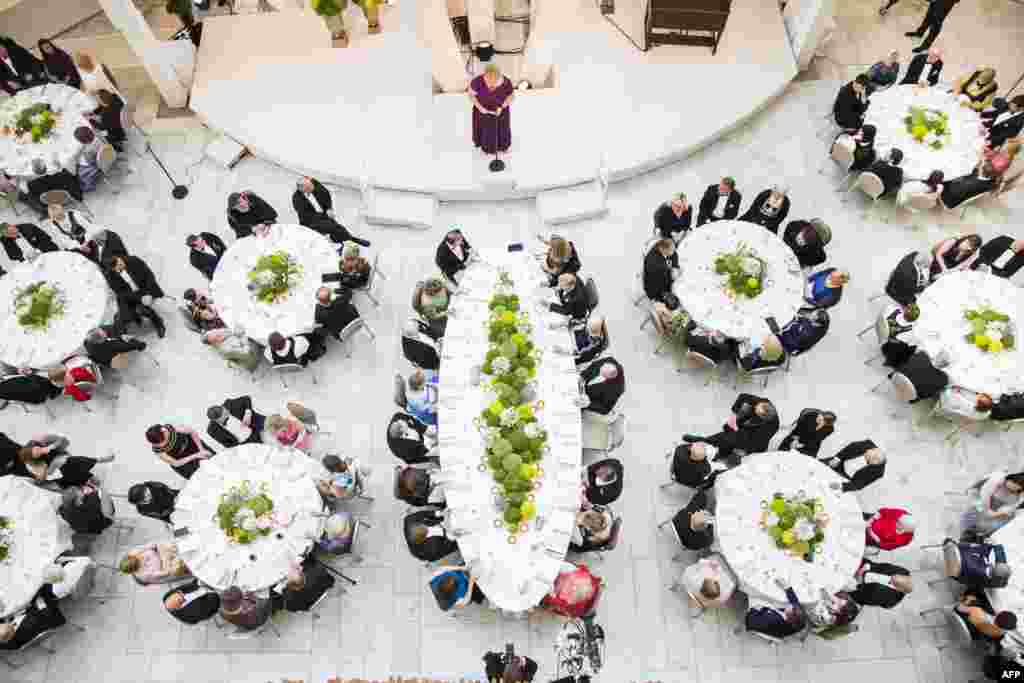 Norway&#39;s Prime Minister Erna Solberg makes a speech during a gala dinner at the Opera House in Oslo in celebration of the 80th birthdays of King Harald and Queen Sonja of Norway.