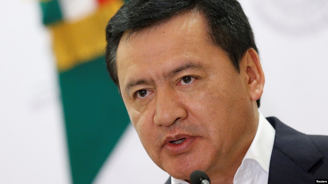 FILE - Mexico's Interior Minister Miguel Angel Osorio Chong gives a speech to the media during a news conference at the Interior Ministry building in Mexico City, Mexico.