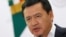 FILE - Mexico's Interior Minister Miguel Angel Osorio Chong gives a speech to the media during a news conference at the Interior Ministry building in Mexico City, Mexico.