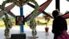 South Sudan's President Salva Kiir prays at the John Garang Memorial during events marking the third anniversary of South Sudan's independence in Juba, July 9, 2014. 