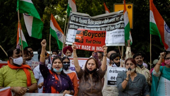 Indian protestors under the banner of Bharat Tibet Sahyog Manch (BTSM), a Hindu rightwing organization shout anti-China slogans near Chinese embassy in New Delhi, Oct. 20, 2020.