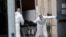 U.S. Army personnel remove the body of a deceased person from the The Riverside Premiere Rehabilitation & Healing Center senior facility on Manhattan's Upper West Side during the outbreak of the coronavirus disease in New York City, April 13, 2020.