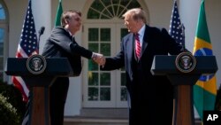 Дональд Трамп и Жаир Болсонару во время пресс-конференции в Розовом саду Белого дома, Вашингтон, 19 марта, 2019