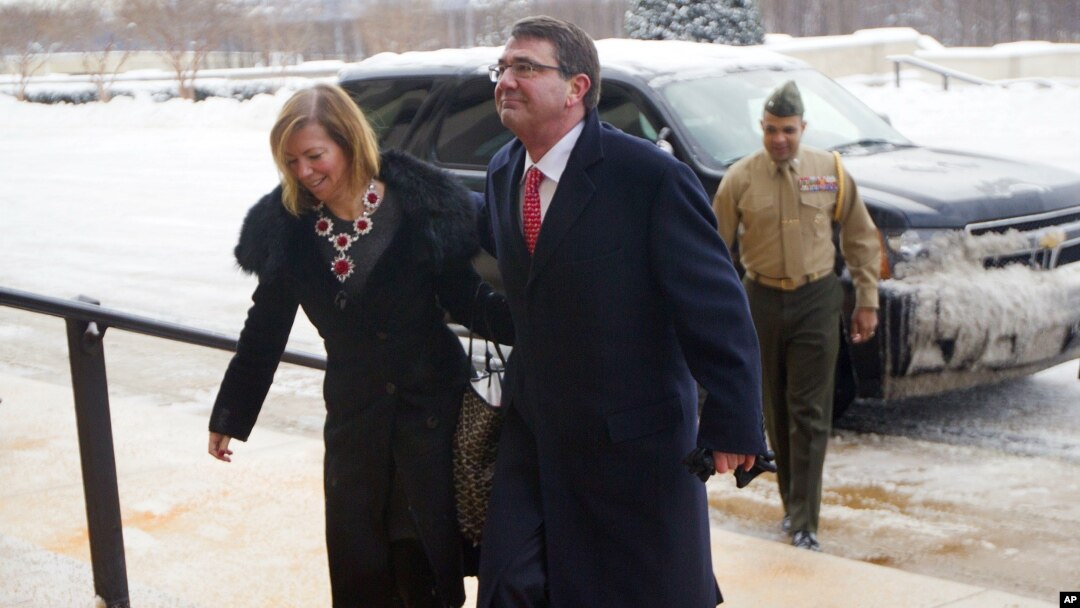 Incoming Defense Secretary Ashton Carter, and his wife Stephanie Carter, during their arrival at the Pentagon in Washington, Feb. 17, 2015.