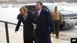 Incoming Defense Secretary Ashton Carter, and his wife Stephanie Carter, during their arrival at the Pentagon in Washington, Feb. 17, 2015.