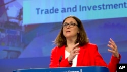 FILE - European Commissioner for Trade Cecilia Malmstroem speaks during a media conference at EU headquarters in Brussels, Tuesday, June 26, 2018.