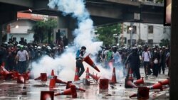 Demonstrators clash with police during a protest against the government's handling of the coronavirus disease (COVID-19) pandemic, in Bangkok, Thailand, August 10, 2021.