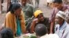 FILE - Farmers attend a plant clinic in East Africa (Courtesy - CABI).