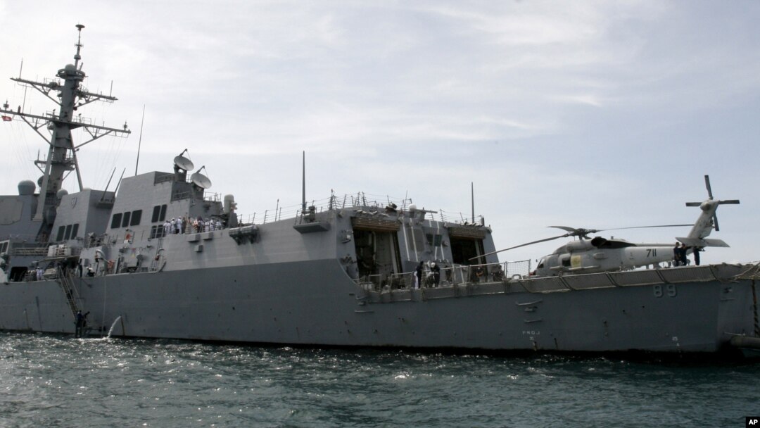 FILE - The guided missile frigate USS Mustin port upon the arrival near Cambodia's port town of Sihanoukville some 185 kilometers (115 miles) southwest of Phnom Penh, Cambodia.