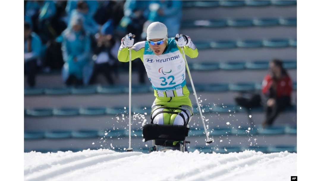 Ma Yu Chol of North Korea competes, March 14, 2018, in the qualification round of the men's 1.1 km sprint, sitting, cross-country skiing at the 2018 Winter Paralympics in Pyeongchang, South Korea.
