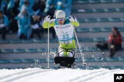 Ma Yu Chol of North Korea competes, March 14, 2018, in the qualification round of the men's 1.1 km sprint, sitting, cross-country skiing at the 2018 Winter Paralympics in Pyeongchang, South Korea.