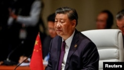 FILE - Chinese President Xi Jinping attends the plenary session of the 2023 BRICS Summit at the Sandton Convention Centre in Johannesburg, South Africa on Aug. 23, 2023.
