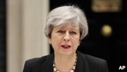 Perdana Menteri Inggris Theresa May berbicara tentang serangan teror di luar kantor sekaligus kediamannya 10 Downing Street, London.