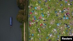 Abandoned tents are seen at the Reading Festival campsite after the event, in Reading, Britain.