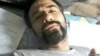 FILE - Iranian citizen-journalist Soheil Arabi is seen in an undated photo from a prison in Iran.