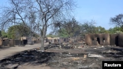 A view shows a burnt compound after an attack by Boko Haram militants in the village of Ngouboua, Feb. 13, 2015. Boko Haram fighters attacked the village in Chad on Friday. 