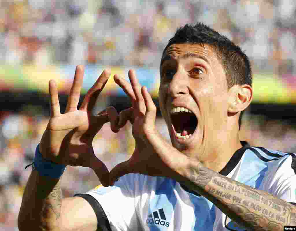 Argentina's Angel Di Maria celebrates his goal against Switzerland during extra time at the Corinthians arena in Sao Paulo, July 1, 2014.