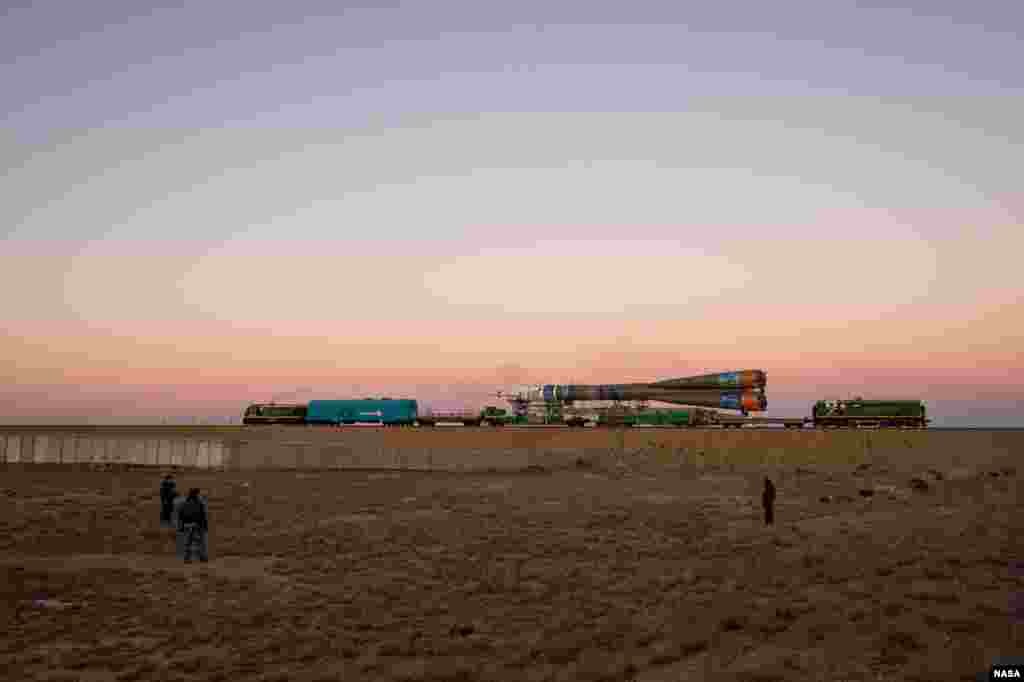 The Soyuz TMA-11M rocket, adorned with the logo of the Sochi Olympic Organizing Committee and other related artwork, is rolled out to the launch pad by train at the Baikonur Cosmodrome in Kazakhstan. Launch of the Soyuz rocket is scheduled for Nov. 7 and will send Expedition 38 Soyuz Commander Mikhail Tyurin of Roscosmos, Flight Engineer Rick Mastracchio of NASA and Flight Engineer Koichi Wakata of the Japan Aerospace Exploration Agency on a six-month mission aboard the International Space Station.