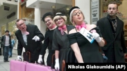 Street entertainers from the Edinburgh Fringe Festival perform in the northern Greek city of Thessaloniki.