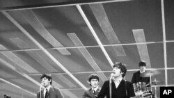 FILE - The Beatles perform. Date unknown.