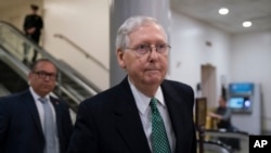 Senate Majority Leader Mitch McConnell, R-Ky., heads to a briefing with Secretary of State Mike Pompeo, Defense Secretary Mark Esper and other national security officials on the details of the threat that prompted the U.S. to kill Iranian Gen. Soleimani.