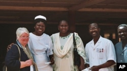 Jill Sheffield with staff at a clinic in Burkina Faso, where FCI has successfully implemented an effective model of maternal health care delivery.