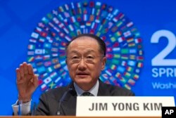 FILE - World Bank President Jim Yong Kim speaks at IMF headquarters in Washington, April 16, 2016. Kim said the nation still needs to improve its workforce, take care of the environment, and govern in a more transparent way. But he said years of strong economic growth are a lesson for the rest of the world.