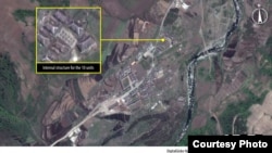FILE - Housing construction is underway at Camp 16, North Korea, in May 2013. 