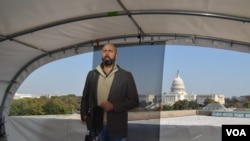 Spanish broadcaster JP Zarruk reporting live from the new standup location on the rooftop of VOA's headquarters in Washington, DC.