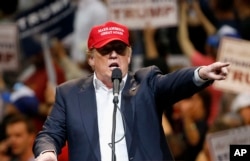 Republican presidential candidate Donald Trump speaks during a campaign rally Saturday, March 19, 2016, in Tucson, Arizona.