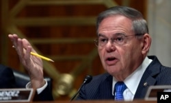 Sen. Bob Menendez, D-N.J., asks a question of Secretary of State Mike Pompeo during testimony before the Senate Foreign Relations Committee on Capitol Hill in Washington, July 25, 2018, during a hearing on diplomacy and national security.