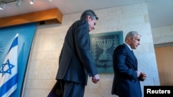 وزیر خارجه آمریکا (چپ) و همتای اسرائیلی او.