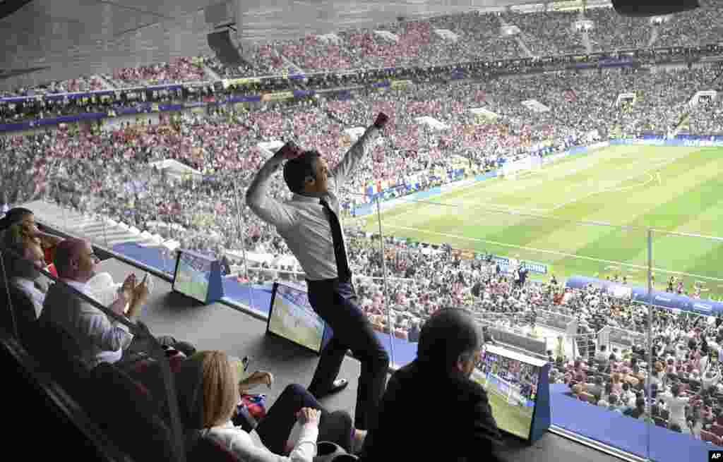 French President Emmanuel Macron reacts during the final match between France and Croatia at the 2018 soccer World Cup in the Luzhniki Stadium in Moscow, July 15, 2018. 