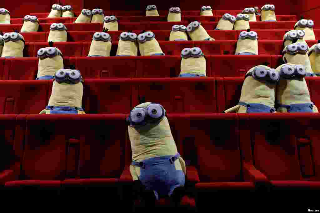 Minions toys are seen on cinema chairs to maintain social distancing between spectators at a MK2 cinema in Paris as cinemas reopen doors to the public following the coronavirus disease (COVID-19) outbreak in France.