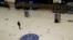 Social distancing guidelines on the floor by train departure information screens to help stop the spread of coronavirus in Waterloo station, London, June 4, 2020.