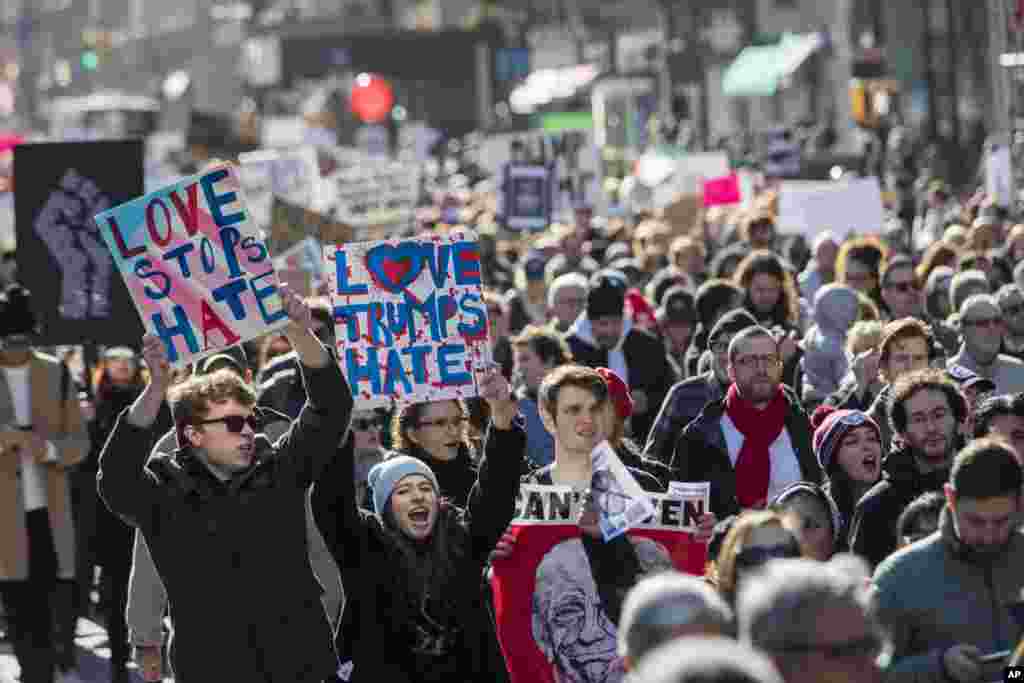 Demonstrators chant slogans as they march up Fifth Avenue in New York during a protest against the election of President-elect Donald Trump, Nov. 12, 2016.