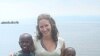 Peace Corps volunteers like Sonia Morhange, seen here in Rwanda, are no longer as isolated from home as they once were.