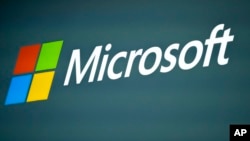 FILE - The Microsoft logo is shown at the Mobile World Congress 2023 in Barcelona, Spain, March 2, 2023. Microsoft said on March 8, 2024, that it is still trying to evict the Russian government hackers who broke into the email accounts of senior company executives in November.