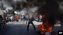 Manifestan ki tap boule kawoutchou (Foto achiv)