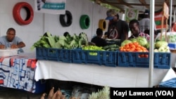 Fruits et légumes au marché local, à Lomé, Togo, le 6 juillet 2019. (VOA/Kayi Lawson)