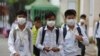 FILE: Students wear masks to avoid the contact of coronavirus at a high school in Phnom Penh, Cambodia, Tuesday, Jan. 28, 2020. (AP Photo/Heng Sinith) 